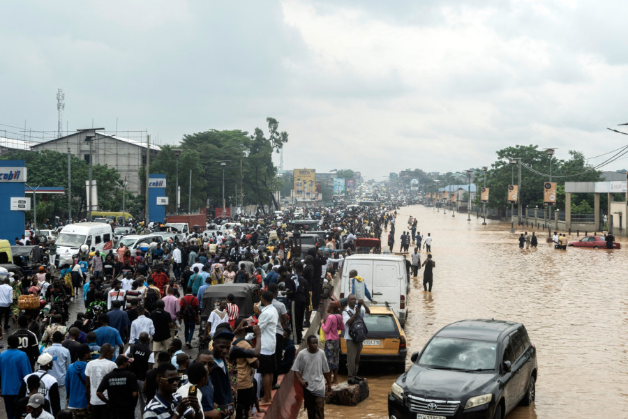 Total deluge: Floods in the streets; The dead are being counted PHOTO