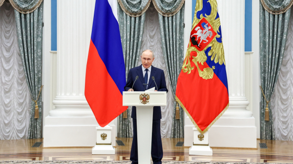 Putin wins; First decision already made