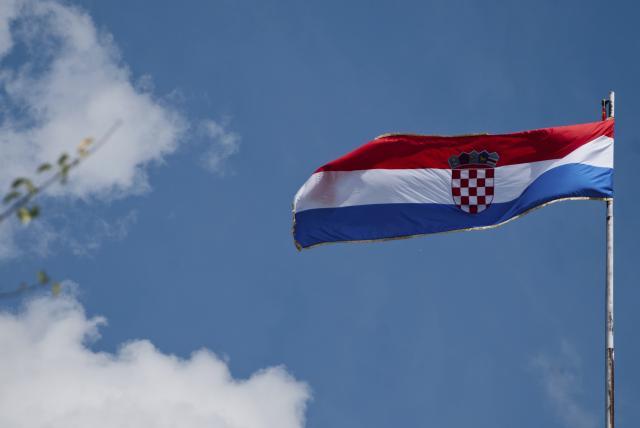 Croatian minister denies wearing fascist uniform hat