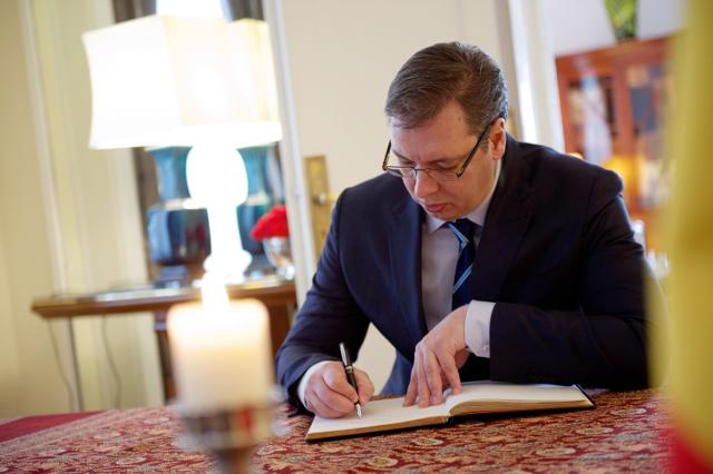 Vucic signs condolence book at Belgian embassy