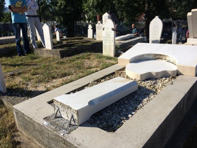 Suspects arrested for damaging headstones in Muslim cemetery