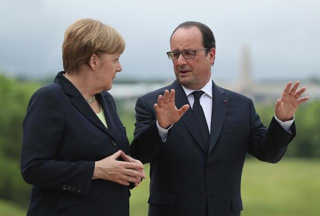 Oland i Merkel: Veæa saradnja protiv onih koji seju strah
