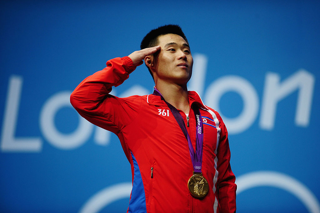 Спортивный костюм кндр. Спортсмены из южной кореи. Северная корея на олимпийских играх. Спортсмены из северной кореи. Олимпийские игры в корее.