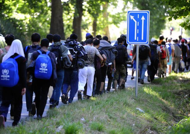 Slovenian police detains migrants, and Serbians helping them