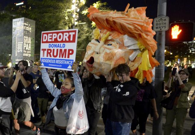 Thousands protest against Trump in major U.S. cities