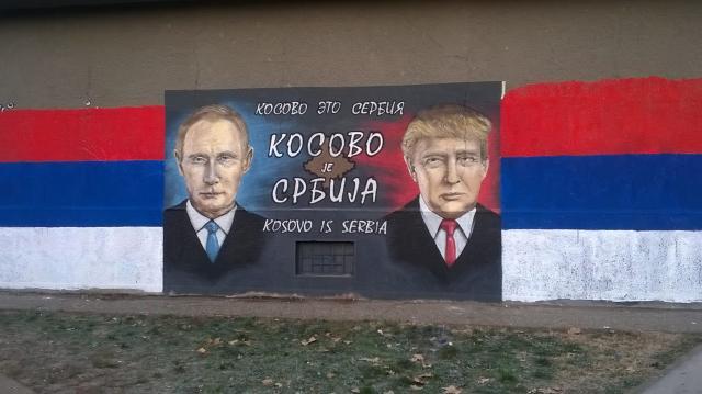Mural shows Putin, Trump, and message 