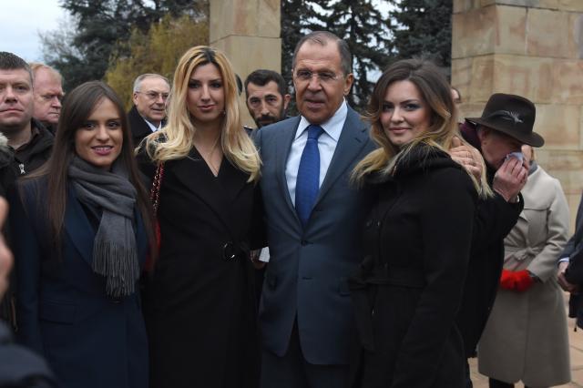 Man featured in Interpol notice seen in photo with Lavrov