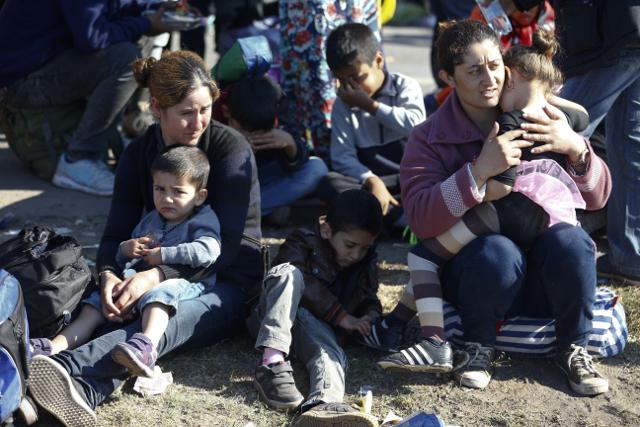 A file photo of a group of migrants in Roszke, near the Hungarian border with Serbia (Tanjug/AP)