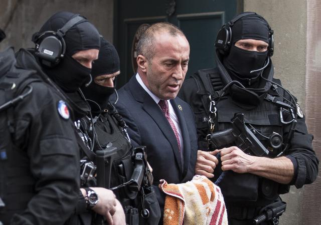 Haradinaj is escorted by the French police (Tanjug/AP, file)