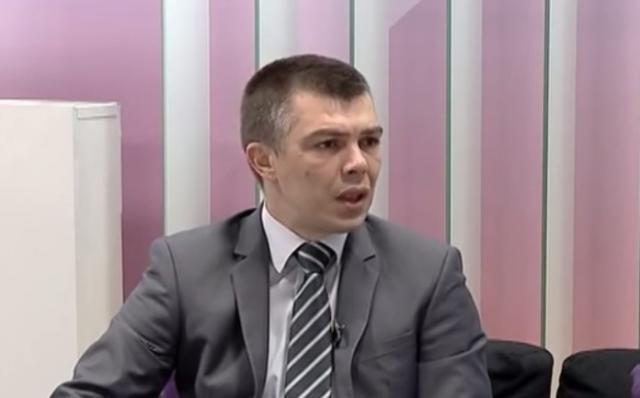 Gun-toting Serb politician shouts 