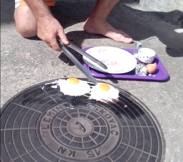 Kad "upeèe zvezda": Leskovèanin na poklopcu šahte ispržio jaja