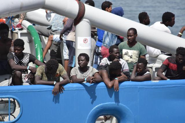 Migrants are seen on July 1 on board the Swedish rescue ship Bkv 002, before disembarking in Sicily (Tanjug/AP)