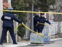 Kosovo police are seen near the scene of the crime on Tuesday (Tanjug/AP)