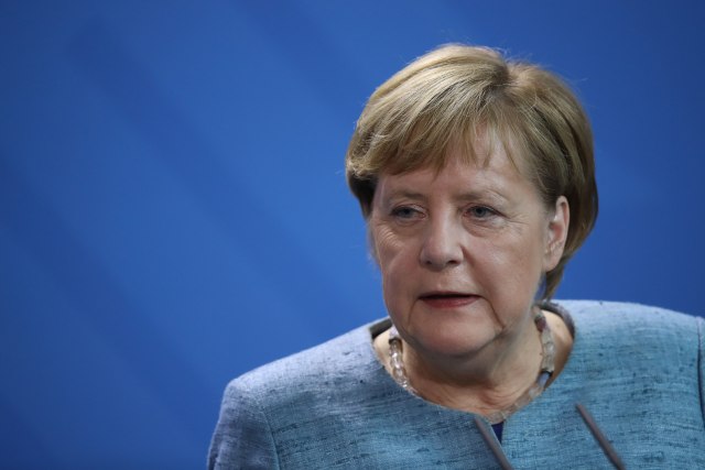 Merkelova i Konte se sreli u Davosu