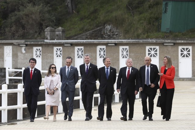 What is G7's message to Belgrade and Pristina?