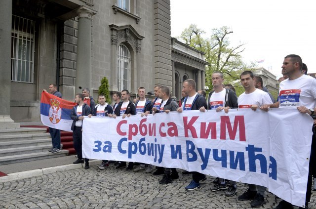 The banner reads, 'Serbs from KiM, for Serbia and Vucic' (Tanjug)