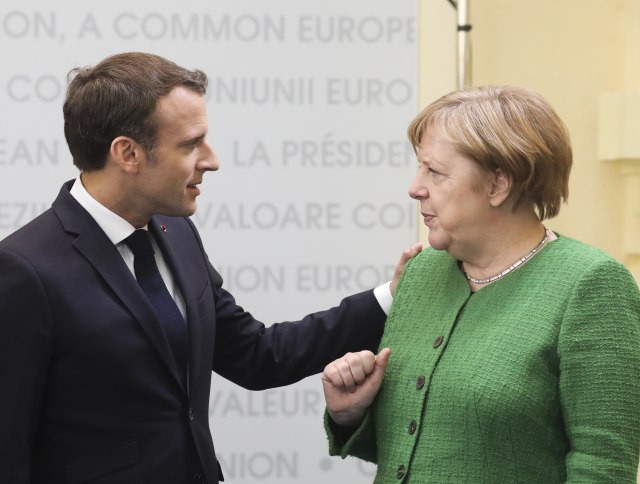 Makron: Podržao bih Merkelovu, ako želi na èelo Evropske komisije
