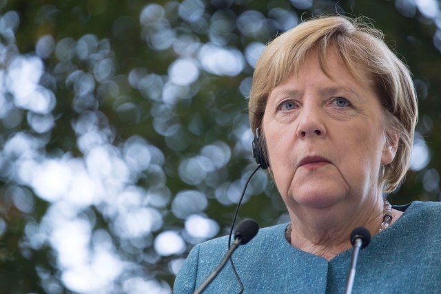 What message does Angela Merkel's visit send?