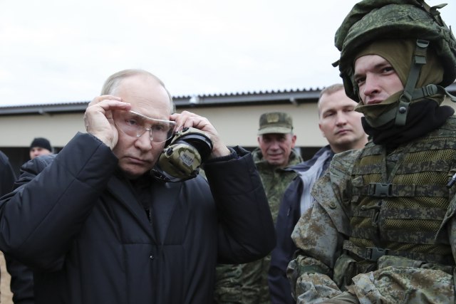 Tanjug/Mikhail Klimentyev, Sputnik, Kremlin Pool Photo via AP, File