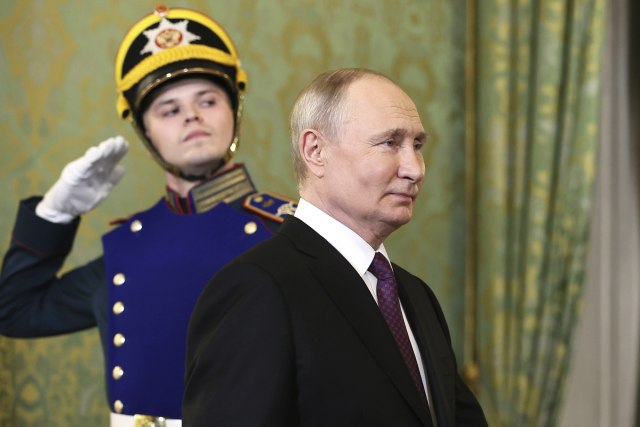 Tanjug/Sergei Bobylev, Sputnik, Kremlin Pool Photo via AP