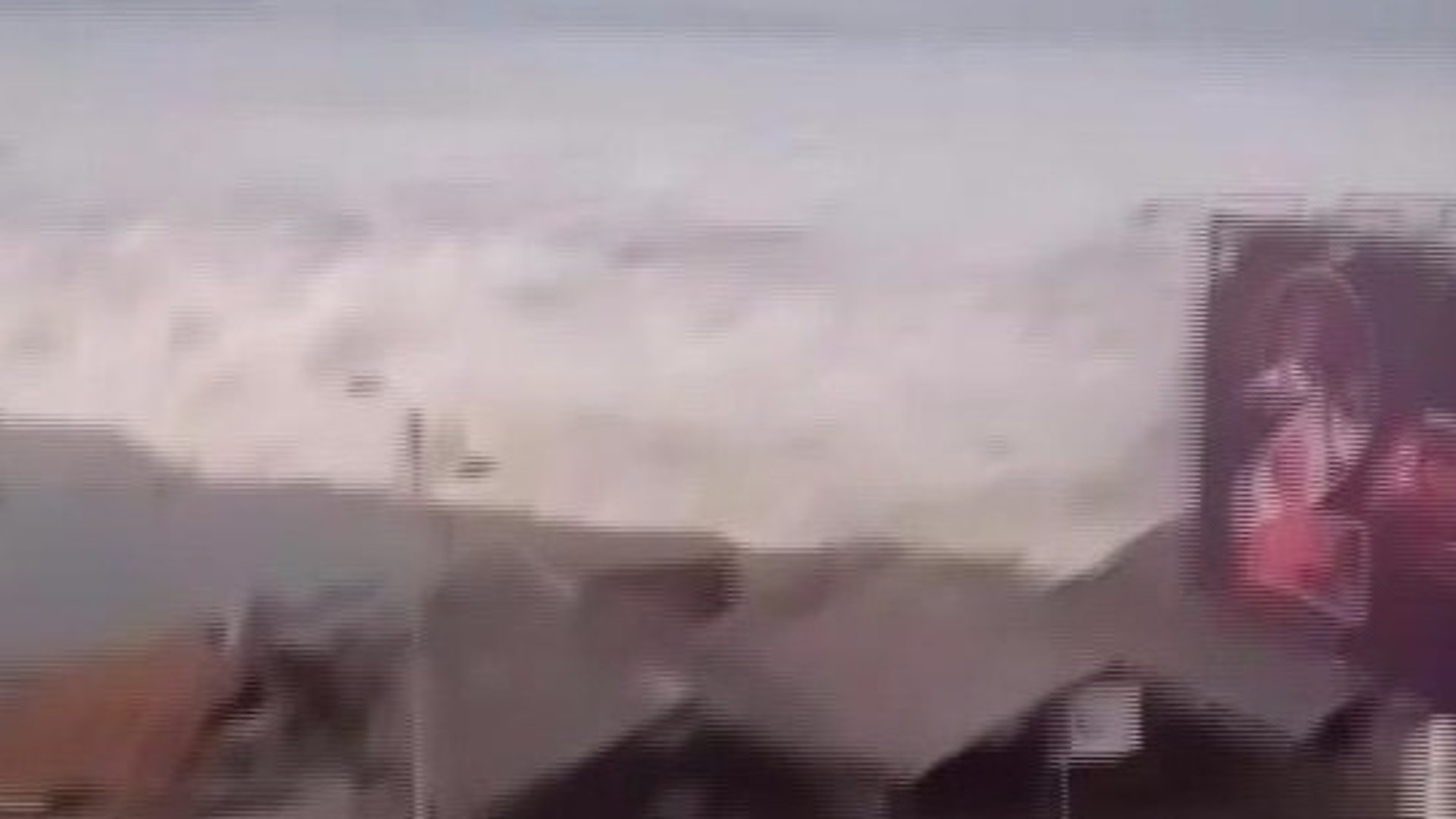 Video shows tsunami hitting city